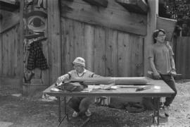 [Chip adjusts model canoe]
