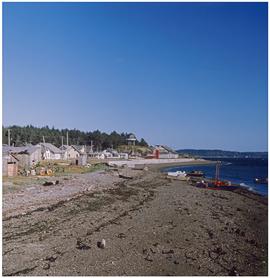 Haida,' Masset beach and small wooden buildings