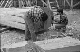 Crew working on log at the Turnbull & Gail construction yard in Richmond (contractors for bui...