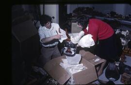 Inge Ruus and a student unpacking
