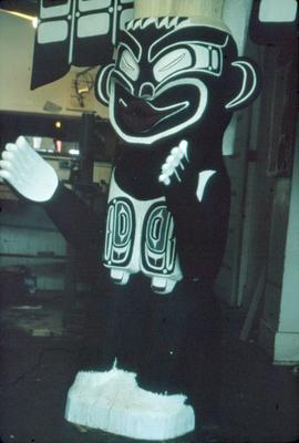 Freestanding figure with white feet