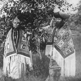 Reverend Thomas Crosby and unidentified woman in blankets and headdresses