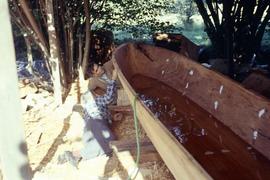 Unfinished canoe with Doug Cranmer and Godfrey Hunt