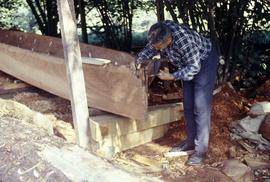 Carving the Nootka canoe