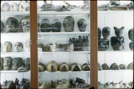 Northwest Coast masks in cabinet