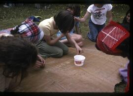 Children playing with toothpicks
