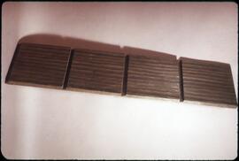 Image of a board with kerfs