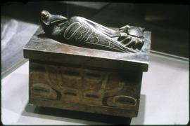 Box with figural carvings on display in Montréal
