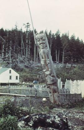 Unidentified totem pole, decaying and leaning