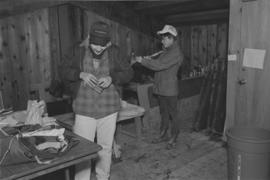 [Inside carving hut]