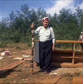 Man with carved stick, Alert Bay