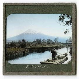 Boat on river in front of Mount Fujiyama