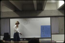 Instructor teaching a drawing class