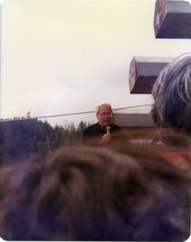 Bill Reid speaking at pole raising in Skidegate