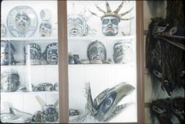 Northwest Coast masks in cabinet