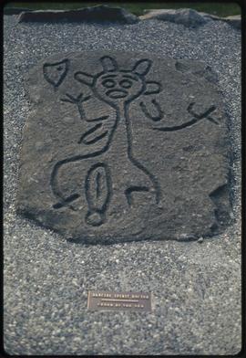 Dancing spirit doctor, Cedar By The Sea, petroglyph reproduction, Centennial Museum, Nanaimo, B.C.