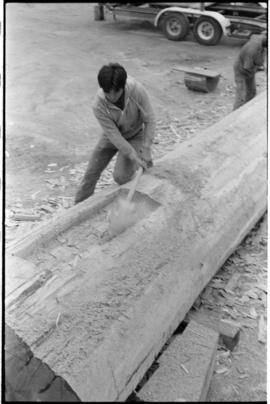 Crew working on log at the Turnbull & Gail construction yard in Richmond (contractors for bui...