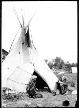 Portrait of two men in front of tipi, view four
