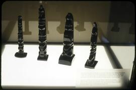 Argillite model totem poles on display in Montréal