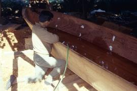 Working on a canoe