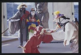 Masked Korean dancers perform a scene from Pongsan mask dance