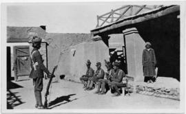 Military officer posed with riffle