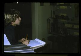 Child viewing items in visible storage