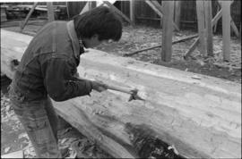 Crew working on log at the Turnbull & Gail construction yard in Richmond (contractors for bui...