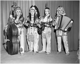 Dan George & band in traditional clothing