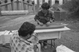 [Preparing model canoe for first steam]