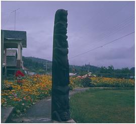 Skidegate totem pole on residential street