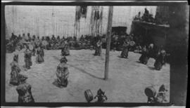 Monks performing a ritual dance in ceremonial masks