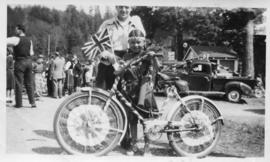 Man, girl, and bicycle