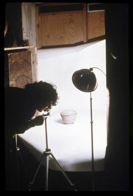 Laura Greenberg photographing baskets