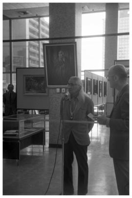 Chief Dan George, Centennial opening of display, Vancouver Public Library with painting of Dan Ge...