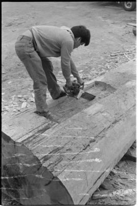 Crew working on log at the Turnbull & Gail construction yard in Richmond (contractors for bui...