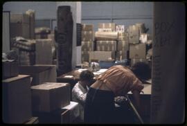 Packing items in the old museum basement