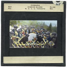 People at Bompas Grave in Carcross