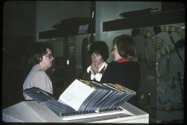 Madeline Rowan and museum staff in visible storage