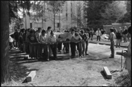 Crew moving log from the Turnbull & Gail construction yard in Richmond (contractors for build...