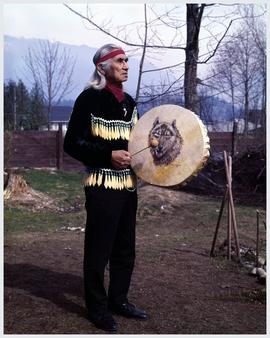 Ole Antoine,' Dan George, Burrard Reserve, North Vancouver holding a drum painted by Minn Sjoselth