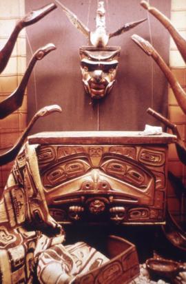 Bentwood boxes, Chilkat blanket, mask, and other items on display in Montréal