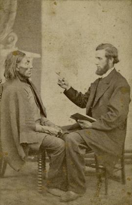 Portrait of Crosby seated with another man