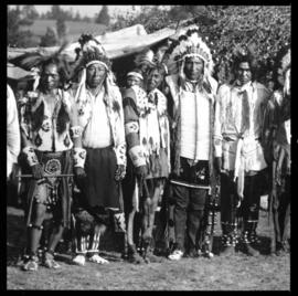 Group portrait of men in native clothing, view two