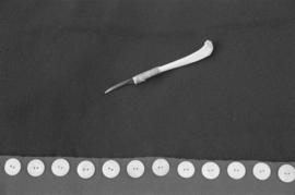 [Carving tool on blanket]