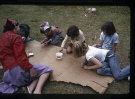 Children playing with toothpicks