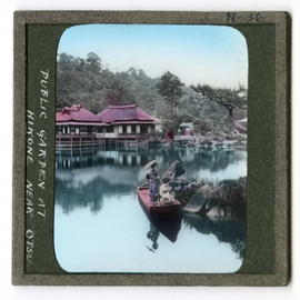 Boat on body of water with buildings