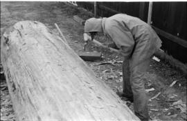 Crew working on log at the Turnbull & Gail construction yard in Richmond (contractors for bui...