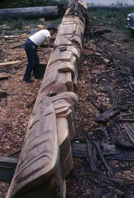 Partially carved pole