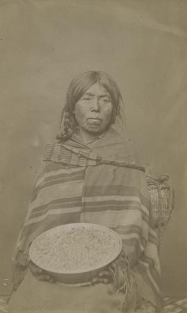[Northwest Coast Indigenous woman with harvest bowl, Fraser River, B. C.]